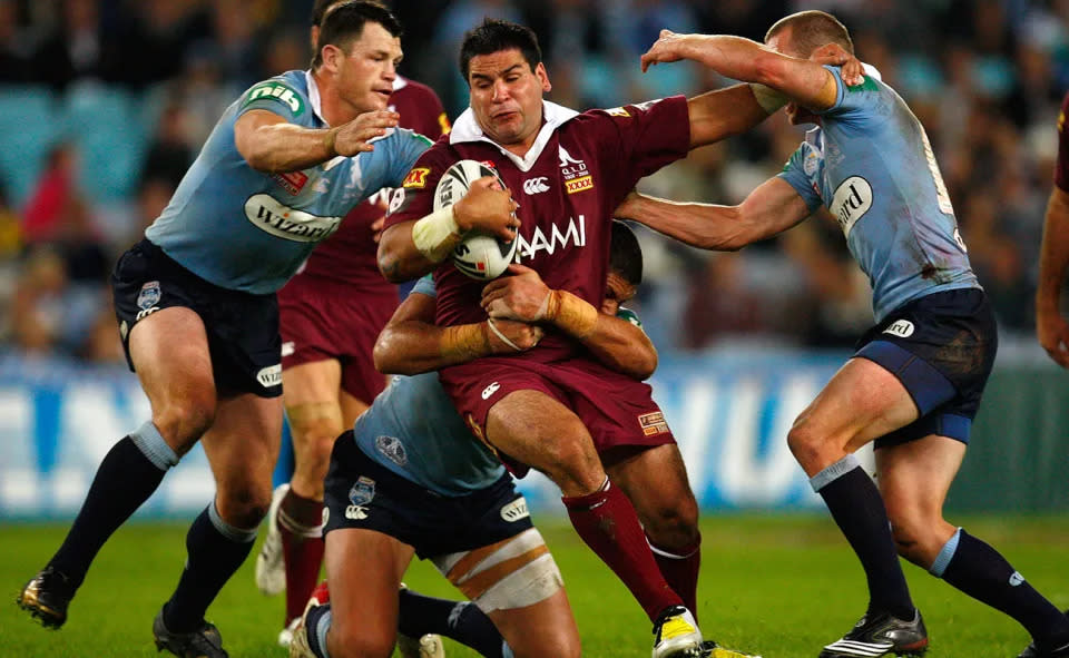 This photo shows Carl Webb in action for Queensland in the 2008 State of Origin series.