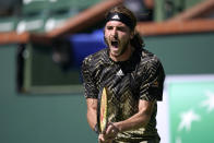 Stefanos Tsitsipas, of Greece, reacts to losing a point to Nikoloz Basilashvili, of Georgia, at the BNP Paribas Open tennis tournament Friday, Oct. 15, 2021, in Indian Wells, Calif. (AP Photo/Mark J. Terrill)