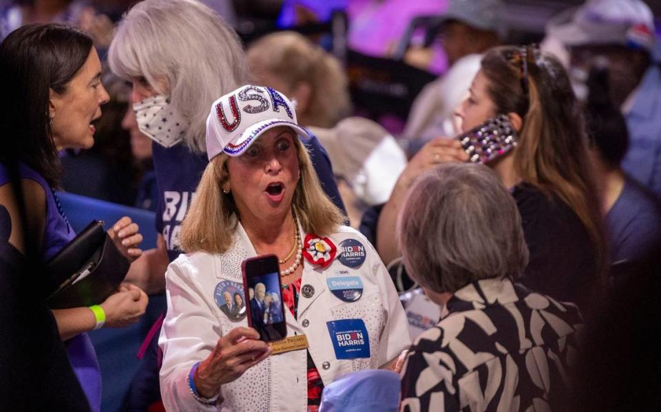 President Joe Biden Supporter, Brenda Pollard, shows off a photo of the president on her phone prior to a campaign event at the Jim Graham building at the North Carolina State Fairgrounds in Raleigh on Friday June 28, 2024. Biden debated former President Trump in Atlanta Georgia the previous night.