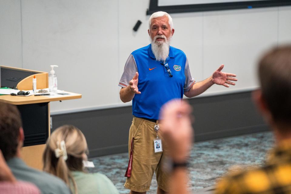 New Wellington Middle-High School Principal Troy Krotz introduces with staff members on Monday, Aug. 7, 2023.