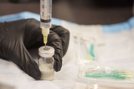 Gail Dufault, the Transitional Healthcare Coordinator at the Barnstable County House of Corrections, prepares a dose of Vivitrol at the prison in Buzzards Bay, Massachusetts September 2, 2014. REUTERS/Brian Snyder