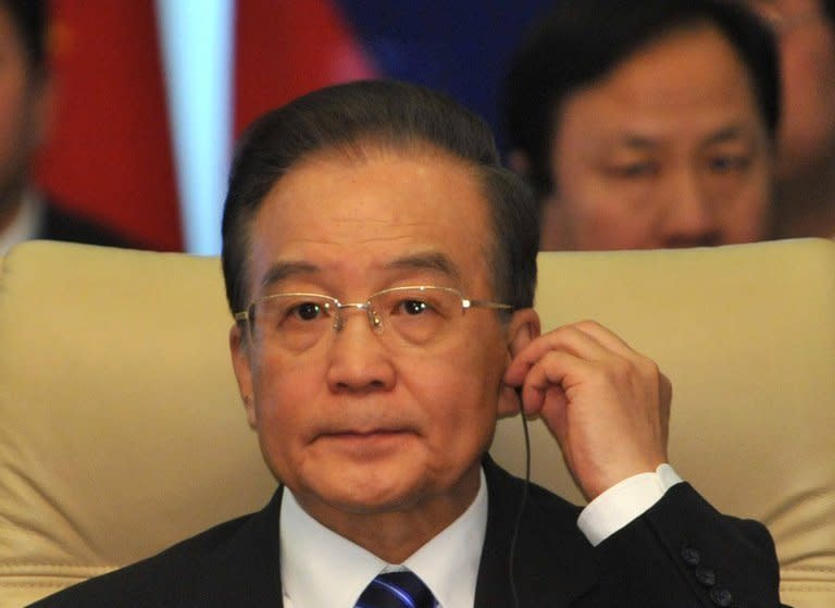 The New York Times said hackers stole its corporate passwords and accessed the personal computers of 53 employees after the newspaper published a report on the family fortune of China's Premier Wen Jiabao, who is pictured here on December 5, 2012