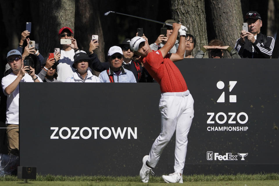 Collin Morikawa of the United States hits his tee shot on the second hole in the final round of the PGA Tour Zozo Championship at the Narashino Country Club in Inzai on the outskirts of Tokyo, Sunday, Oct. 22, 2023. (AP Photo/Tomohiro Ohsumi)