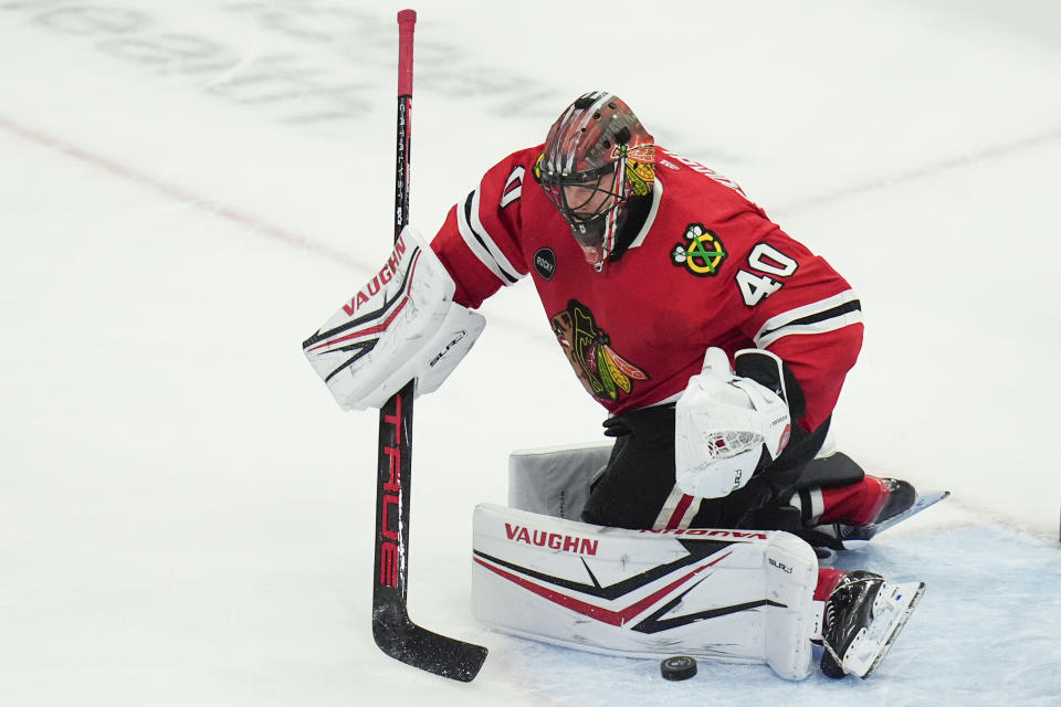 Chicago Blackhawks goaltender Arvid Soderblom makes a save against the Nashville Predators during the first period of an NHL hockey game Friday, April 12, 2024, in Chicago. (AP Photo/Erin Hooley)