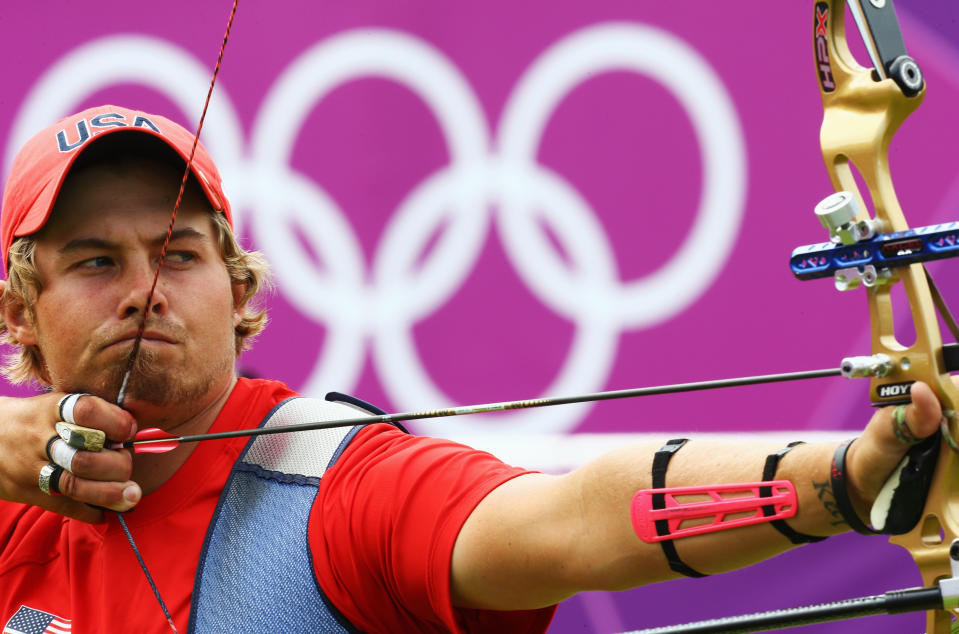 LONDON, ENGLAND - AUGUST 01: Brady Ellison of United States competes in his Men's Individual Archery 1/32 Eliminations match against Mark Javier orf Philippenes during the Men's Individual Archery on Day 5 of the London 2012 Olympic Games at Lord's Cricket Ground on August 1, 2012 in London, England. (Photo by Paul Gilham/Getty Images)