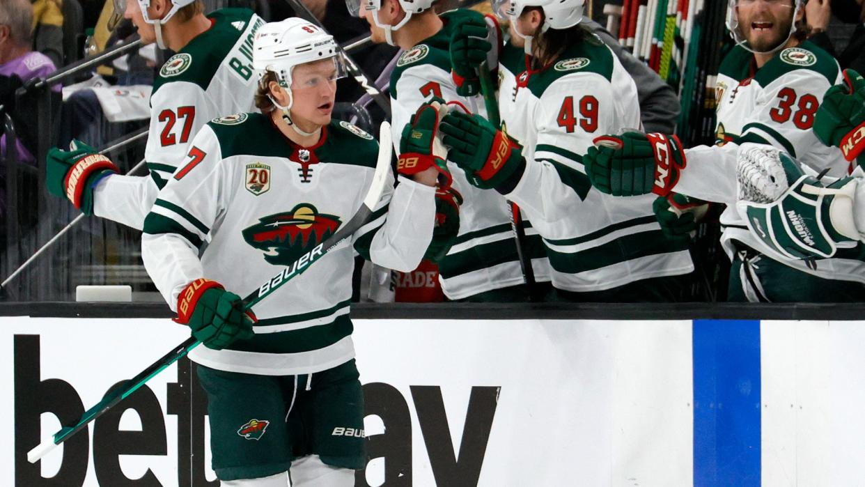 LAS VEGAS, NEVADA - MAY 28: Kirill Kaprizov #97 of the Minnesota Wild celebrates with teammates on the bench after scoring a second-period power-play goal against the Vegas Golden Knights in Game Seven of the First Round of the 2021 Stanley Cup Playoffs at T-Mobile Arena on May 28, 2021 in Las Vegas, Nevada. The Golden Knights defeated the Wild 6-2 to win the series. (Photo by Ethan Miller/Getty Images)