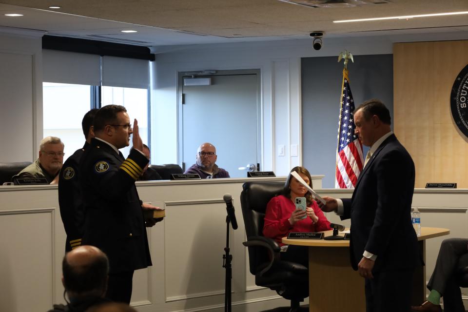 Brent Vickers is sworn in as Southaven's chief of police by Mayor Darren Musselwhite on Tuesday, Jan. 30.