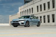 <p>Honda's popular Civic compact car gets a <a href="https://www.caranddriver.com/news/a36232826/2022-honda-civic-sedan-specs/" rel="nofollow noopener" target="_blank" data-ylk="slk:big glow-up for the 2022 model year;elm:context_link;itc:0;sec:content-canvas" class="link ">big glow-up for the 2022 model year</a> as it debuts a more grown-up appearance, new features, and a refined cabin design. The improvements and more helped it earn a spot on <a href="https://www.caranddriver.com/features/a38873223/2022-editors-choice/" rel="nofollow noopener" target="_blank" data-ylk="slk:our Editors' Choice list;elm:context_link;itc:0;sec:content-canvas" class="link ">our Editors' Choice list</a>. A selection of four-cylinder engines—including a turbocharged 1.5-liter—are offered; front-wheel drive will continue to be standard as Honda insists all-wheel drive is not part of the plan. Updated tech features such as a larger infotainment display, wireless smartphone connectivity, and improved <a href="https://www.caranddriver.com/features/g27612164/car-safety-features/" rel="nofollow noopener" target="_blank" data-ylk="slk:driver-assistance features;elm:context_link;itc:0;sec:content-canvas" class="link ">driver-assistance features</a> are all meaningful updates that will help the Civic stave off competition from the likes of the <a href="https://www.caranddriver.com/hyundai/elantra" rel="nofollow noopener" target="_blank" data-ylk="slk:Hyundai Elantra;elm:context_link;itc:0;sec:content-canvas" class="link ">Hyundai Elantra</a>, the <a href="https://www.caranddriver.com/mazda/mazda-3" rel="nofollow noopener" target="_blank" data-ylk="slk:Mazda 3;elm:context_link;itc:0;sec:content-canvas" class="link ">Mazda 3</a>, and the <a href="https://www.caranddriver.com/toyota/corolla" rel="nofollow noopener" target="_blank" data-ylk="slk:Toyota Corolla;elm:context_link;itc:0;sec:content-canvas" class="link ">Toyota Corolla</a>.<br></p><p><a class="link " href="https://www.caranddriver.com/honda/civic" rel="nofollow noopener" target="_blank" data-ylk="slk:Review, Pricing, and Specs;elm:context_link;itc:0;sec:content-canvas">Review, Pricing, and Specs</a></p>