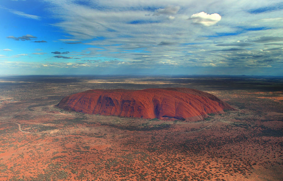 Image: An aerial view of Ayers Rock, or Uluru, Australia. (Newspix / Getty Images file)