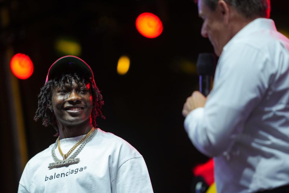 Marquise Brown joins Michael Bidwill, owner of the Cardinals, during a watch party for fans at Cardinal Stadium on Thursday, April 28, 2022, in Glendale. Brown was traded to the Cardinals by the Ravens and was brought to Glendale for the draft party.