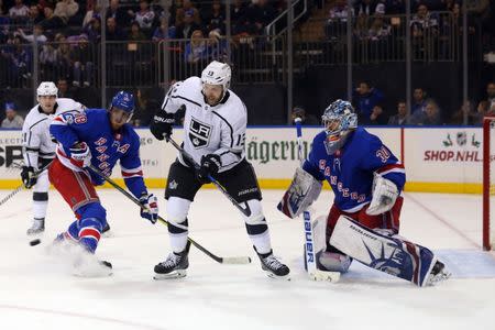 Dec 15, 2017; New York, NY, USA; New York Rangers goalie Henrik Lundqvist (30) makes a save in front of Los Angeles Kings left wing Kyle Clifford (13) during the third period at Madison Square Garden. Mandatory Credit: Brad Penner-USA TODAY Sports