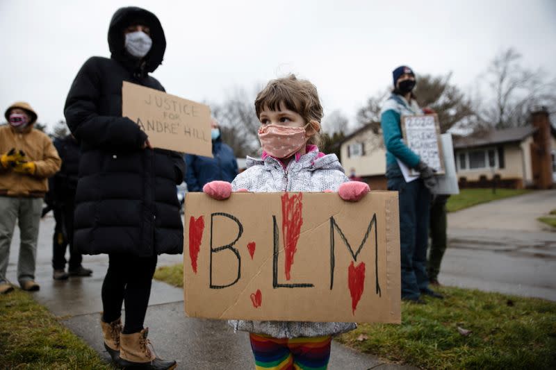 Protesters gather after the killing of Andre Maurice Hill in Columbus, Ohio