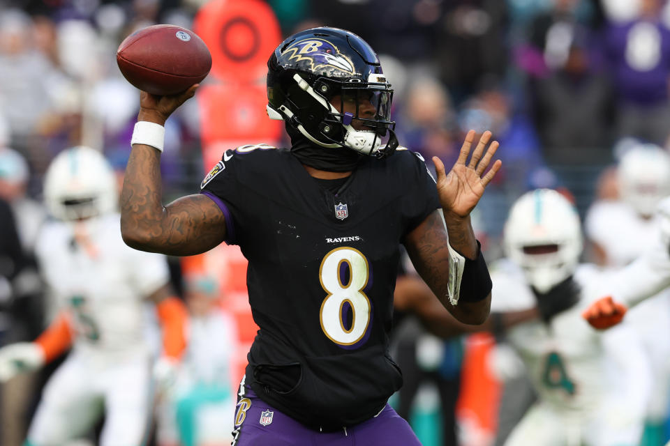 BALTIMORE, MARYLAND - DECEMBER 31: Lamar Jackson #8 of the Baltimore Ravens throws a pass against the Miami Dolphins during the second half of the game at M&T Bank Stadium on December 31, 2023 in Baltimore, Maryland. (Photo by Todd Olszewski/Getty Images)