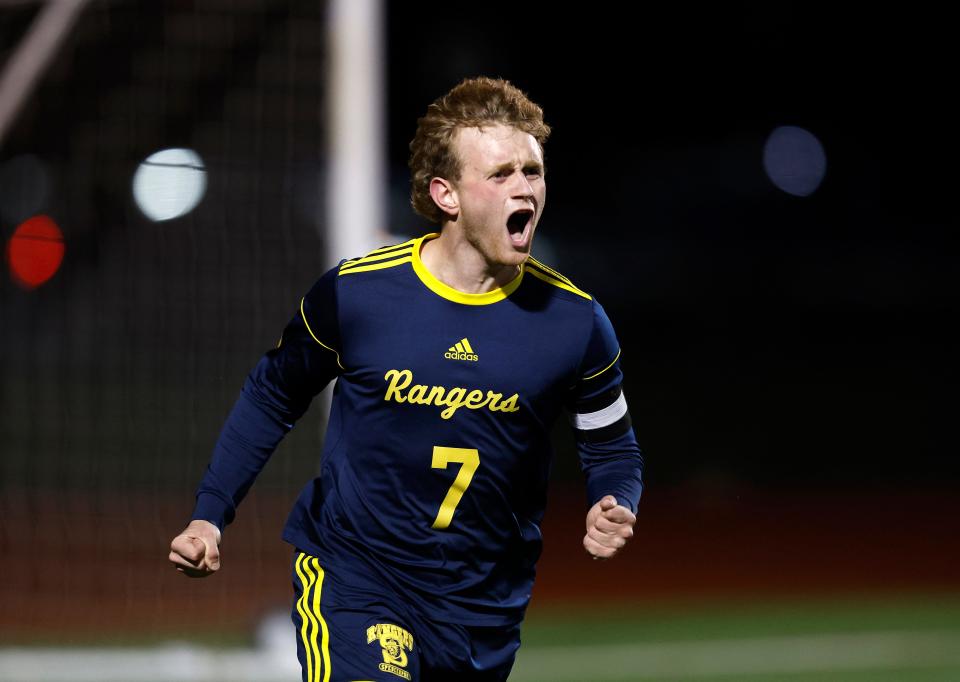 Spencerport’s Kyle Milburn celebrates his goal against Churchville-Chili in the Class AA final.