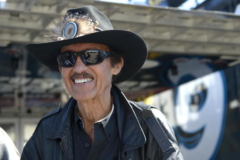 Car owner and and even-time NASCAR champion Richard Petty stands outside his hauler in the garage area during qualifying for the NASCAR Daytona 500 auto race at Daytona International Speedway in Daytona Beach, Fla., Sunday, Feb. 16, 2014. (AP Photo/Phelan M. Ebenhack)