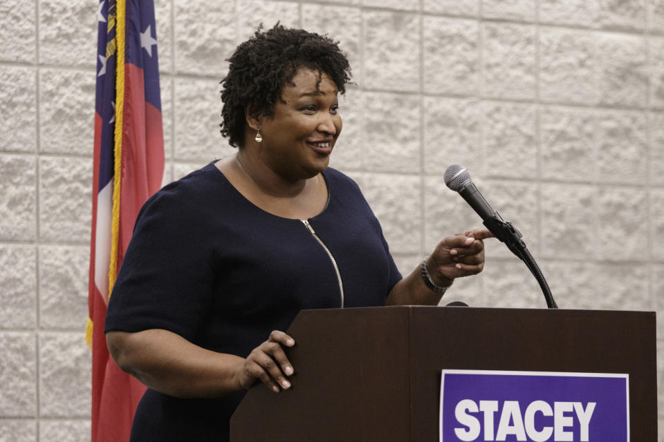 Democratic candidate for governor Stacey Abrams speaks during a town hall forum at the Dalton Convention Center on Wednesday, Aug. 1, 2018, in Dalton, Ga. Abrams is running against Republican candidate Brian Kemp in Georgia's November general election. (Doug Strickland/Chattanooga Times Free Press via AP)