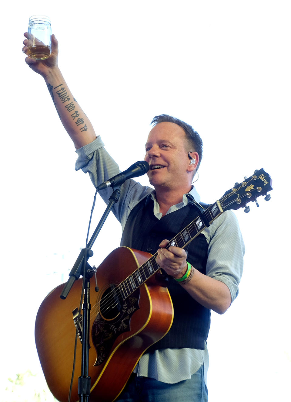 <p>The <i>24</i> actor and country music singer raised a glass to the crowd at the Stagecoach country music festival in Indio, Calif. But don’t worry, Sutherland will still appear onscreen, including in this year’s remake of his movie <i>Flatliners</i>. (Photo: Frazer Harrison/Getty Images for Stagecoach) </p>