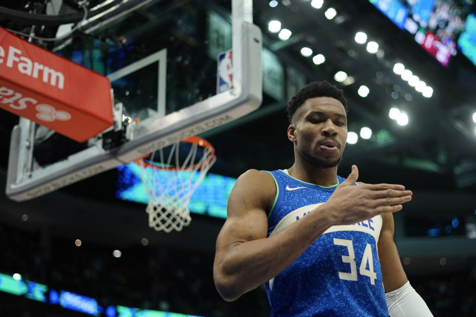 Milwaukee Bucks' Giannis Antetokounmpo gestures before an NBA basketball game against the Miami Heat, Tuesday, Feb. 13, 2024, in Milwaukee. (AP Photo/Aaron Gash)