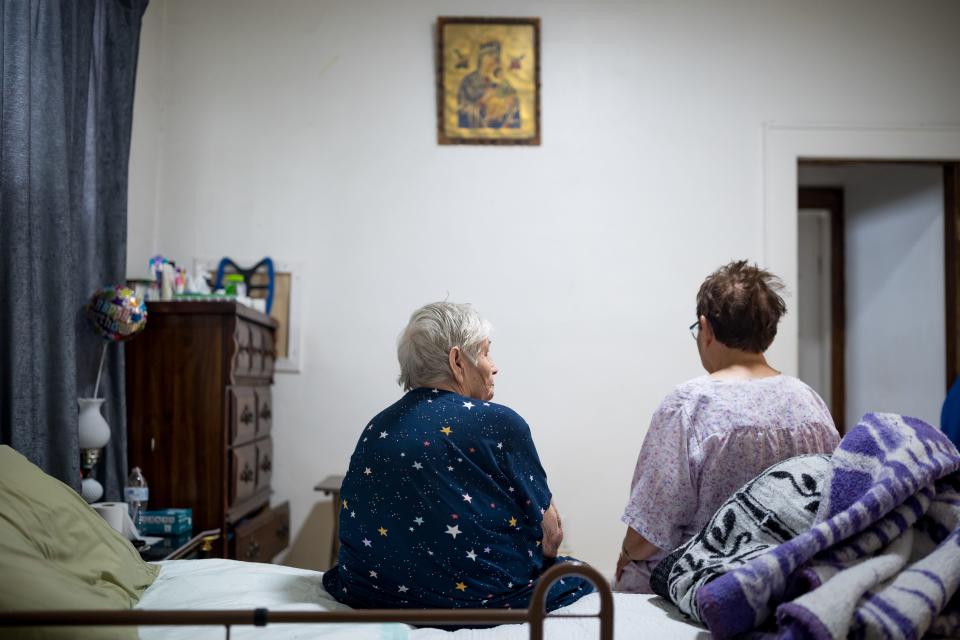 Sisters Maria and Rosa Adame sit inside their home in El Paso's Sunset Heights. A ramp was built in the back of the house because the sisters could no longer safely climb the steep stairs leading to the front door. The project was funded, in part, from El Paso Times reader and other El Pasoan donations to the Senior Fund, an annual holiday campaign.