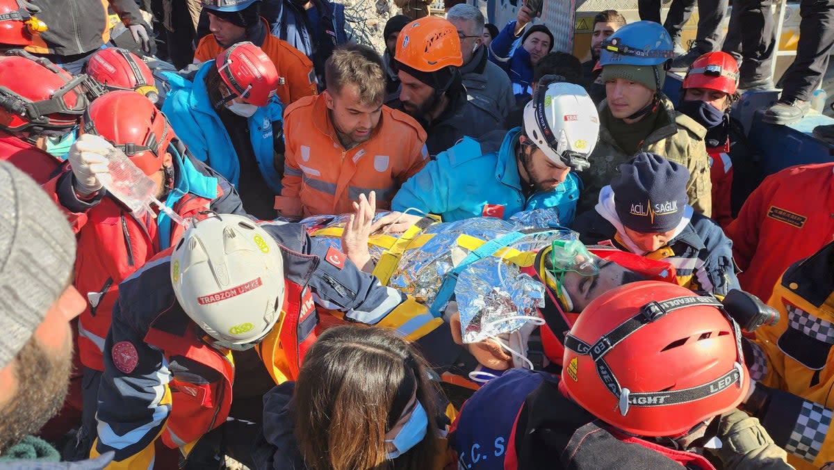 Muhammed Cafer Cetin, 18, is rescued from the rubble 198 hours after the earthquake in Adiyaman, Turkey (Reuters)