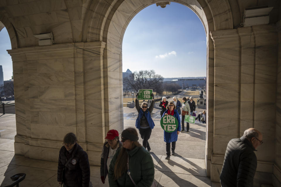 People enter the Minnesota State Capitol for a rally for the ERA on the first day of 2024 Minnesota Legislature session on Monday, Feb. 12, 2024 in St. Paul, Minn. (Renée Jones Schneider/Star Tribune via AP)