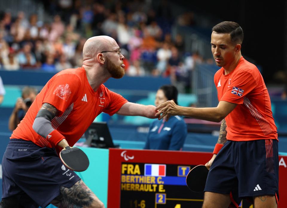 William Bayley and Martin Perry in action (Reuters)