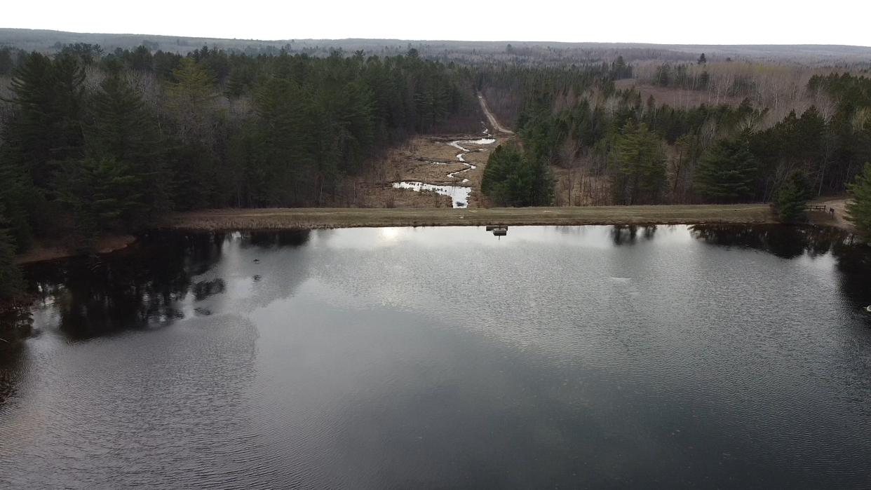 A drone shows the impoundment behind Cornwall Creek Dam in Cheboygan County.