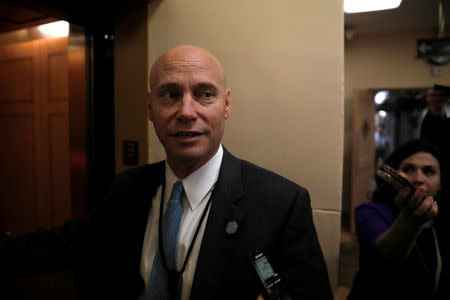 White House Director of Legislative Affairs Marc Short speaks with reporters ahead of the party luncheons on Capitol Hill in Washington, U.S. January 23, 2018. REUTERS/Aaron P. Bernstein