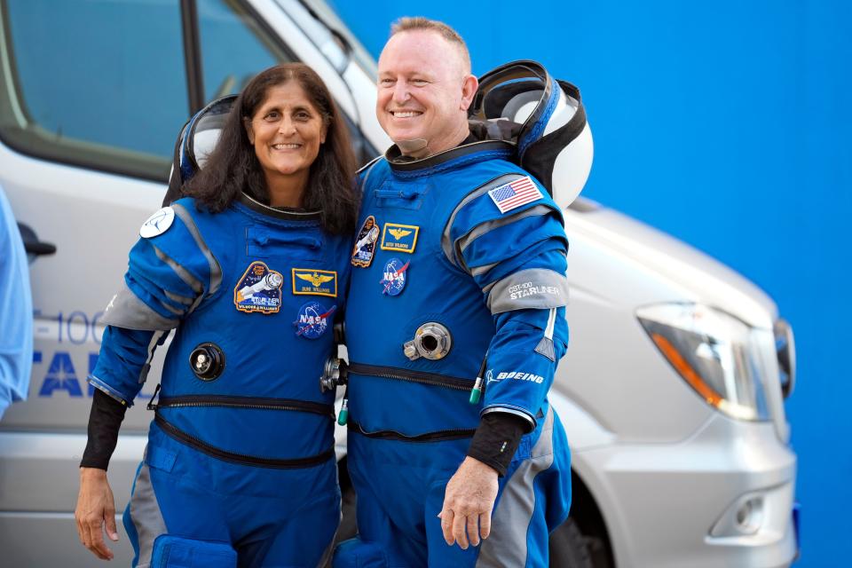 NASA astronauts Suni Williams, left, and Butch Wilmore pose for a photo after leaving the operations and checkout building for a trip to launch pad at Space Launch Complex 41 Wednesday, June 5, 2024, in Cape Canaveral, Fla. The two astronauts are scheduled to liftoff later today on the Boeing Starliner capsule for a trip to the international space station. (AP Photo/Chris O'Meara)