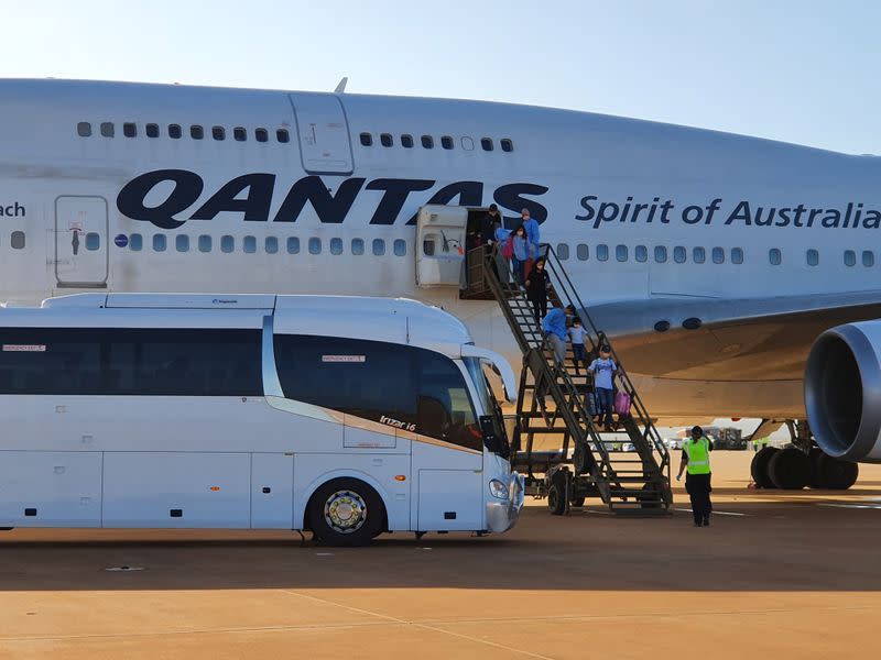 Australian evacuees from Wuhan, China arrive at RAAF base Learmonth in Western Australia on board a chartered Qantas plane prior to their quarantine at Christmas Island