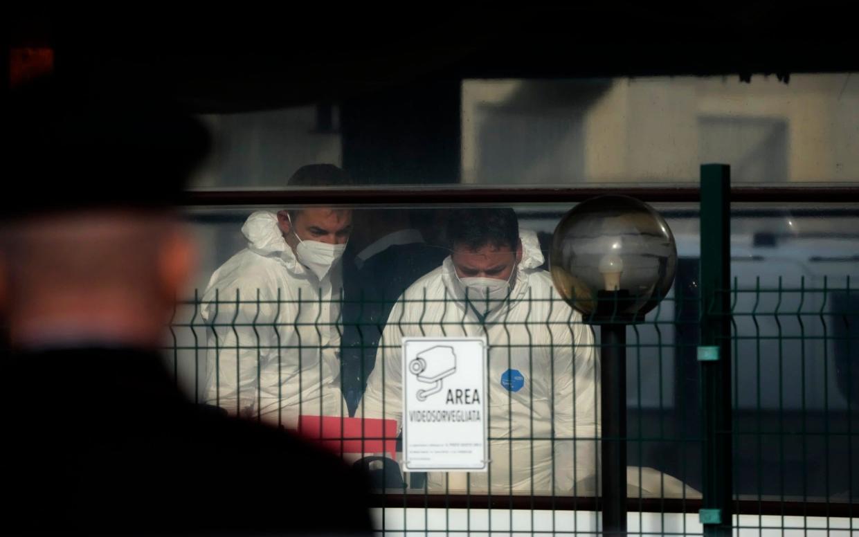 Police carry out forensic investigations in Italy after a shooting in Rome. The city has experienced a worrying number of execution-style killings - AP/Gregorio Borgia