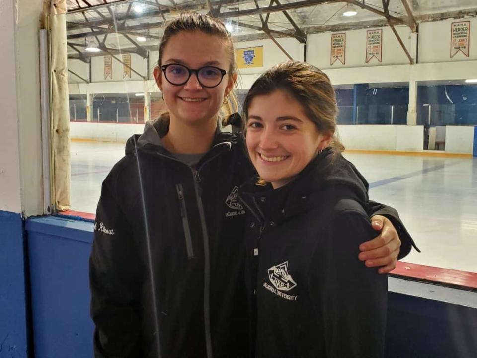 Last weekend, Leah Rideout, left, and Clare Howie became the first two women to officiate at the men's Junior B level in Newfoundland and Labrador.  (Mike Moore/CBC - image credit)