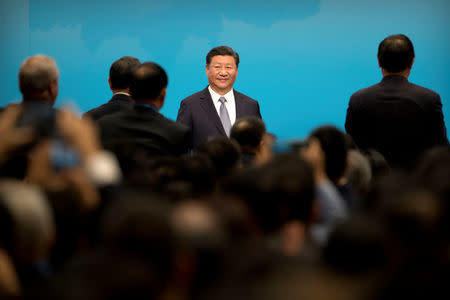 Chinese President Xi Jinping leaves the stage after speaking during the opening ceremony of the BRICS Business Forum at the Xiamen International Conference and Exhibition Center in Xiamen, China September 3, 2017. REUTERS/Mark Schiefelbein/Pool