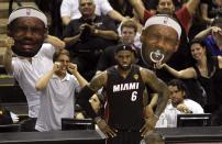 San Antonio Spurs fans taunt Miami Heat's LeBron James during the third quarter in Game 2 of their NBA Finals basketball series in San Antonio, Texas, in this June 8, 2014 file photo. REUTERS/Mike Stone/Files (UNITED STATES - Tags: SPORT BASKETBALL TPX IMAGES OF THE DAY)