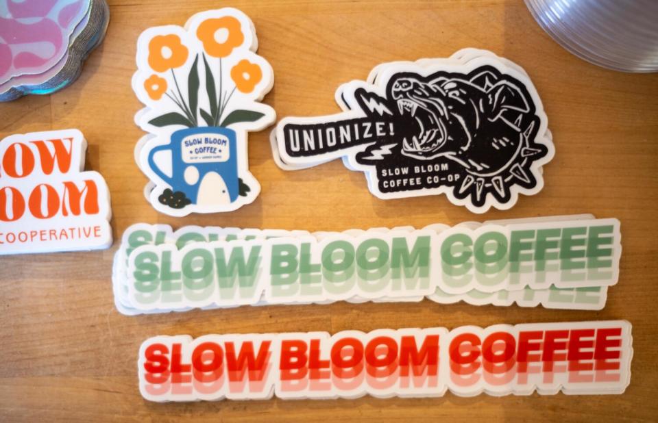 Stickers at the Slow Bloom Coffee Cooperative, a coffee shop