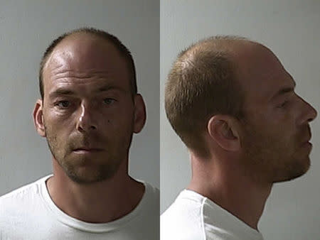 Paul Jones, 42, of Newaygo, Michigan, is shown in this undated booking photo provided by the State of Michigan Attorney General in Lansing, Michigan on June 24, 2014. REUTERS/Michigan Attorney General/Handout via Reuters