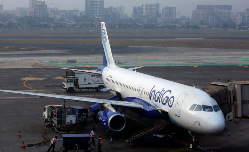 FILE PHOTO: An IndiGo Airlines Airbus A320 aircraft is pictured parked at a gate at Mumbai's Chhatrapathi Shivaji International Airport