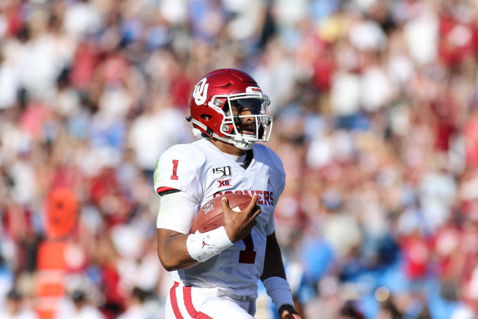 Oklahoma QB Jalen Hurts has changed some scouts' minds with his early-season play. (Getty Images)