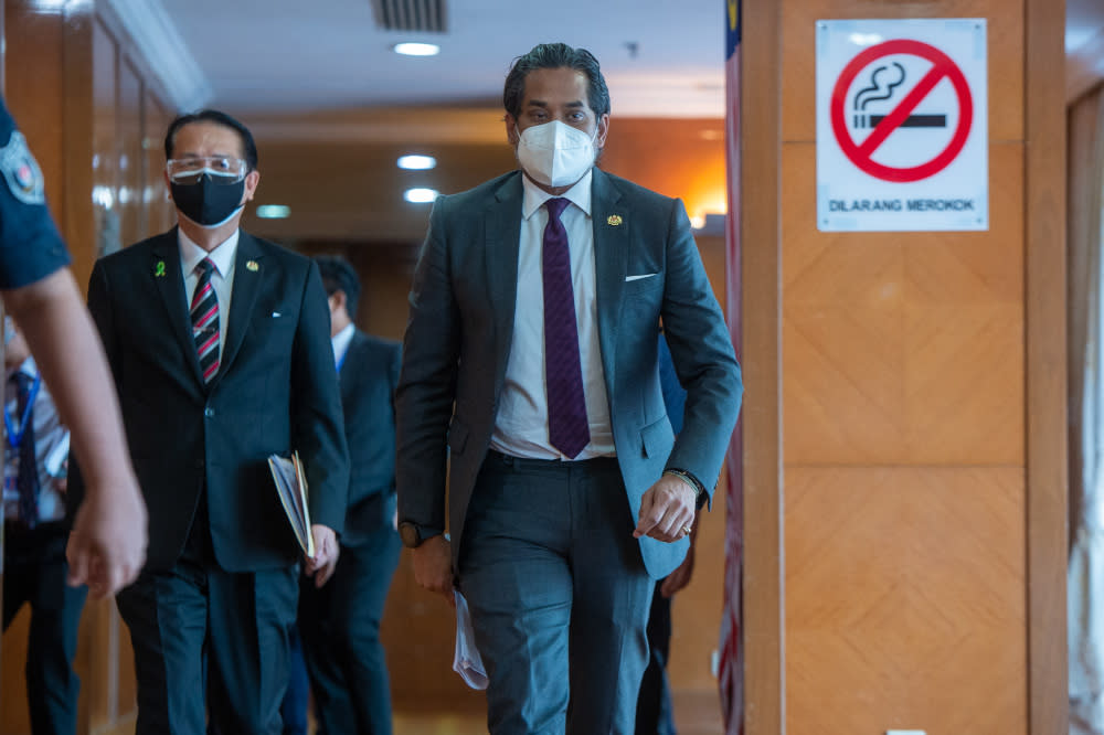 Health Minister Khairy Jamaluddin on his way to a press conference in Putrajaya, September 1, 2021. — Picture by Shafwan Zaidon