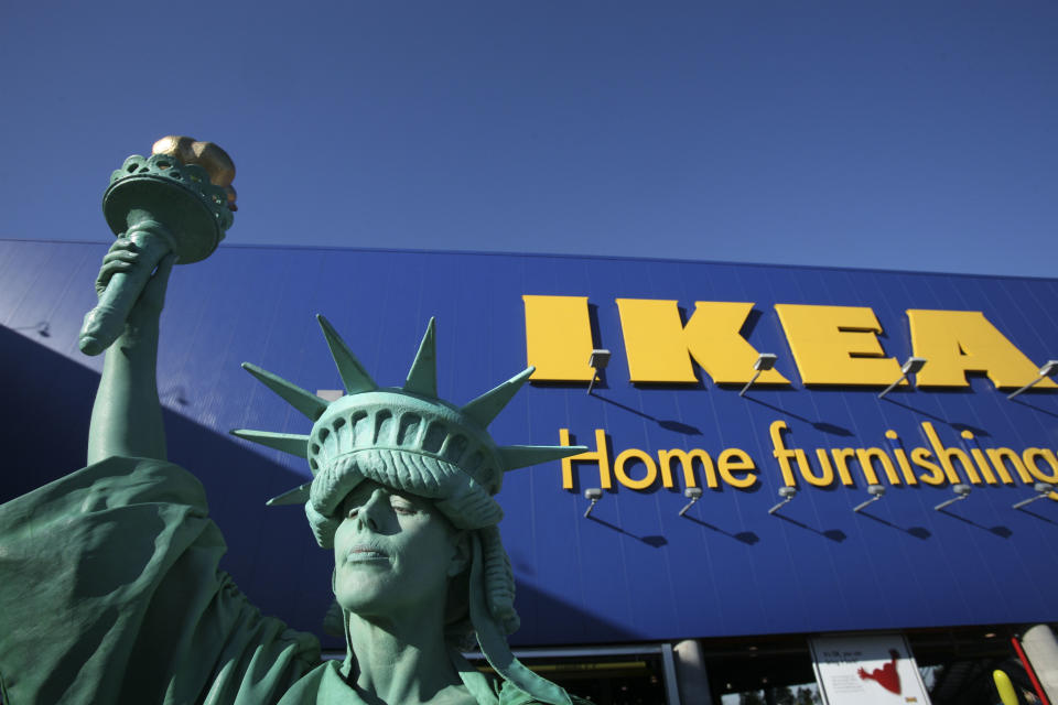 Penny England is the Statue of Liberty during the grand opening of New York City's first Ikea store on Wednesday, June 18, 2008 in the Red Hook section of Brooklyn. The Swedish-based retailer, which sells easy-assembly furniture and house wares, has 34 other stores in the United States. (AP Photo/Mark Lennihan)