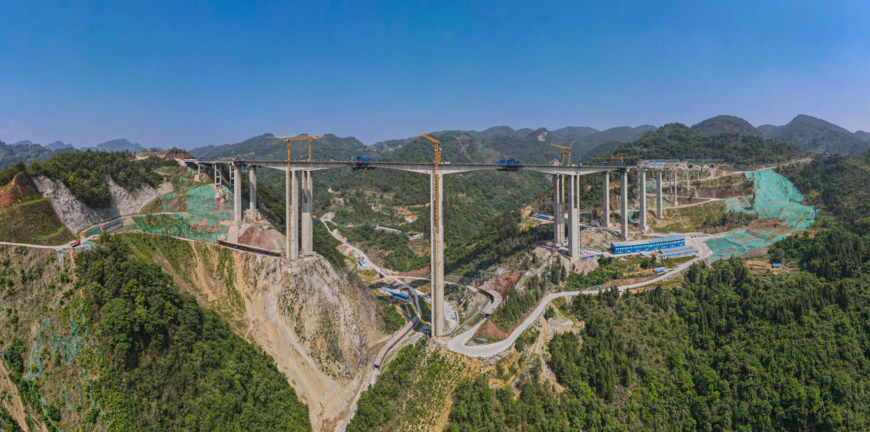 Aerial photo shows the building of the Qingchi Bridge in Jinsha County, Bijie City, Guizhou province, China, May 27, 2023. (Liu Qing/CFOTO/Future Publishing via Getty Images)