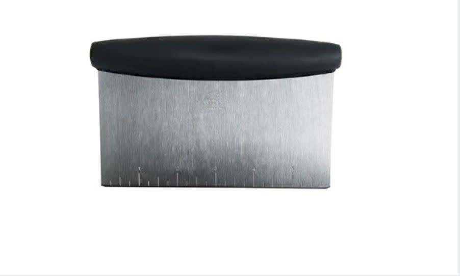 Kelly Fields uses a bench scraper like <a href="https://www.amazon.com/OXO-Multi-purpose-Stainless-Scraper-Chopper/dp/B00004OCNJ" target="_blank" rel="noopener noreferrer">this one from OXO</a>. (Photo: OXO)