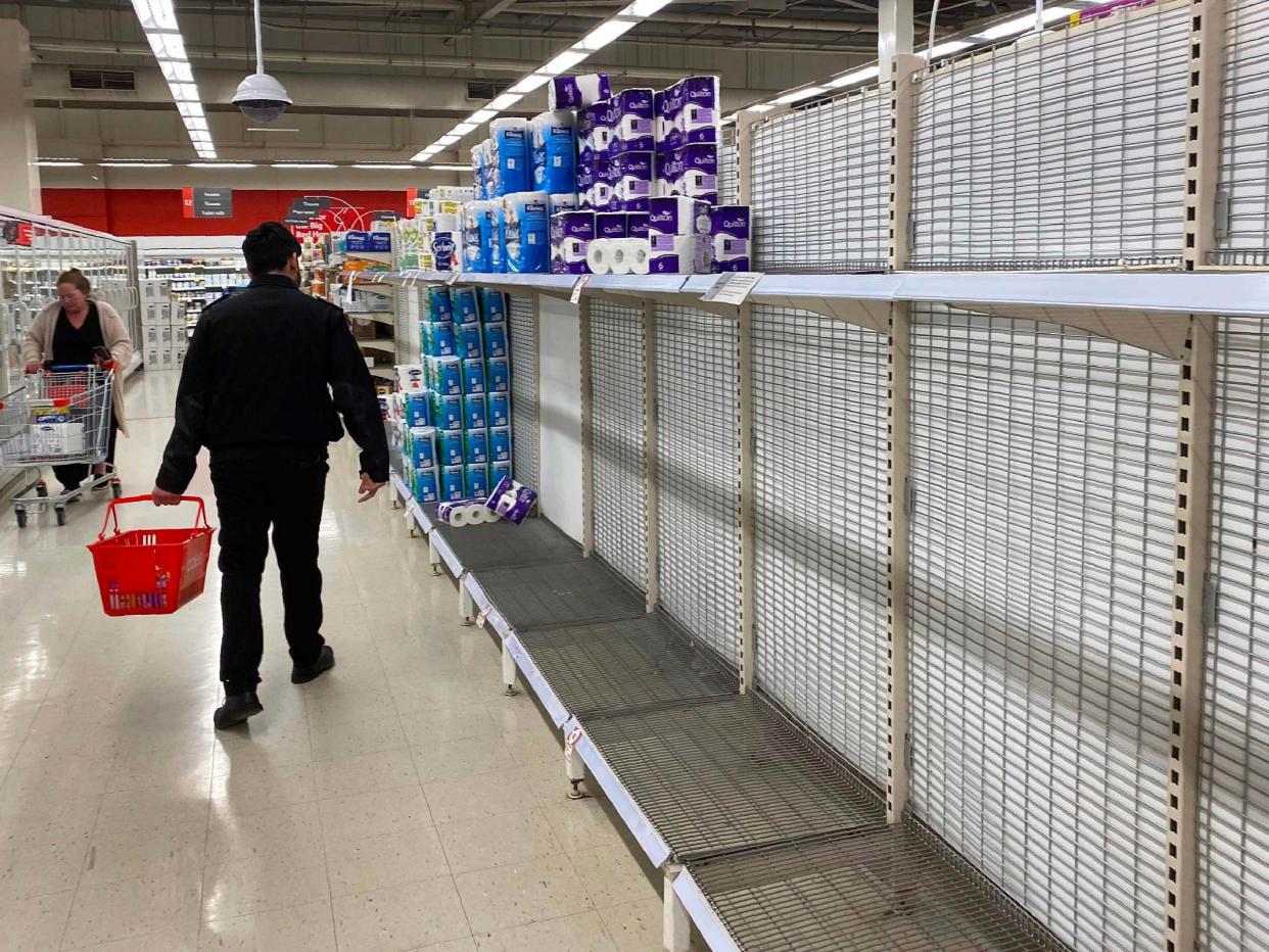 Supermarkets have imposed limits on essential items after panic-buying in Melbourne: AFP via Getty Images