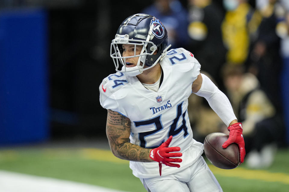 Tennessee Titans cornerback Elijah Molden (24) scores a touchdown on an interception against the Indianapolis Colts in the second half of an NFL football game in Indianapolis, Sunday, Oct. 31, 2021. (AP Photo/AJ Mast)