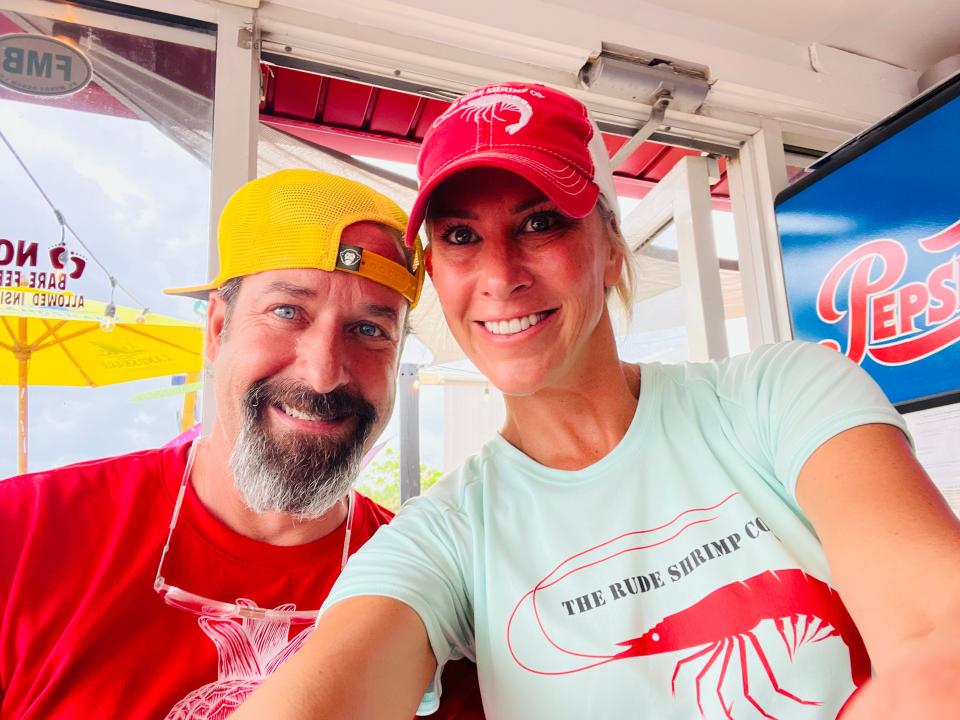 The RUDE Shrimp Company owners TJ Holzapfel and Lisa Lahners at their original location on Fort Myers Beach. That building was washed away by Hurricane Ian.