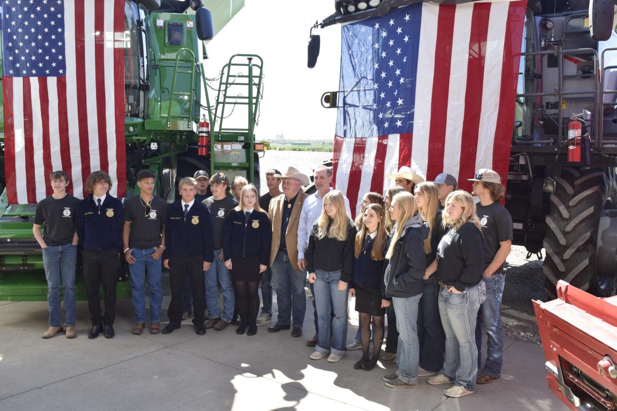 Members of the Southeast of Saline FFA stand with U.S. House Agriculture Committee Chairman, Rep. Glenn "GT" Thompson of Pennsylvania and Rep. Tracey Mann of the Kansas 1st District. The congressmen came to Gypsum as part of a listening tour regarding the United States farm bill.