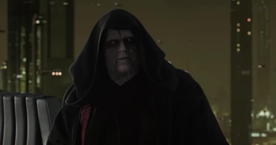 Palpatine in a hooded cloak