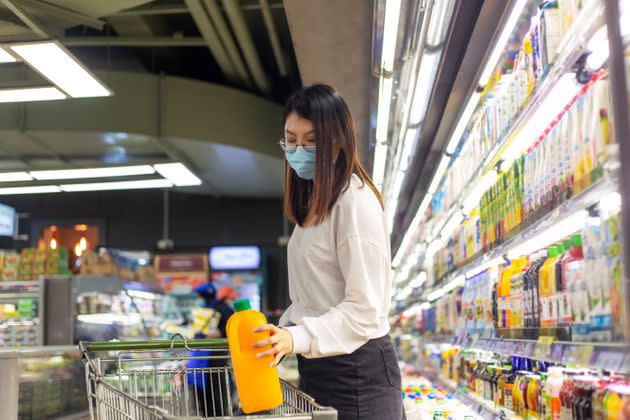 For many Asian Americans, there’s heightened concern about being confronted for still wearing a mask (Photo: gahsoon via Getty Images)