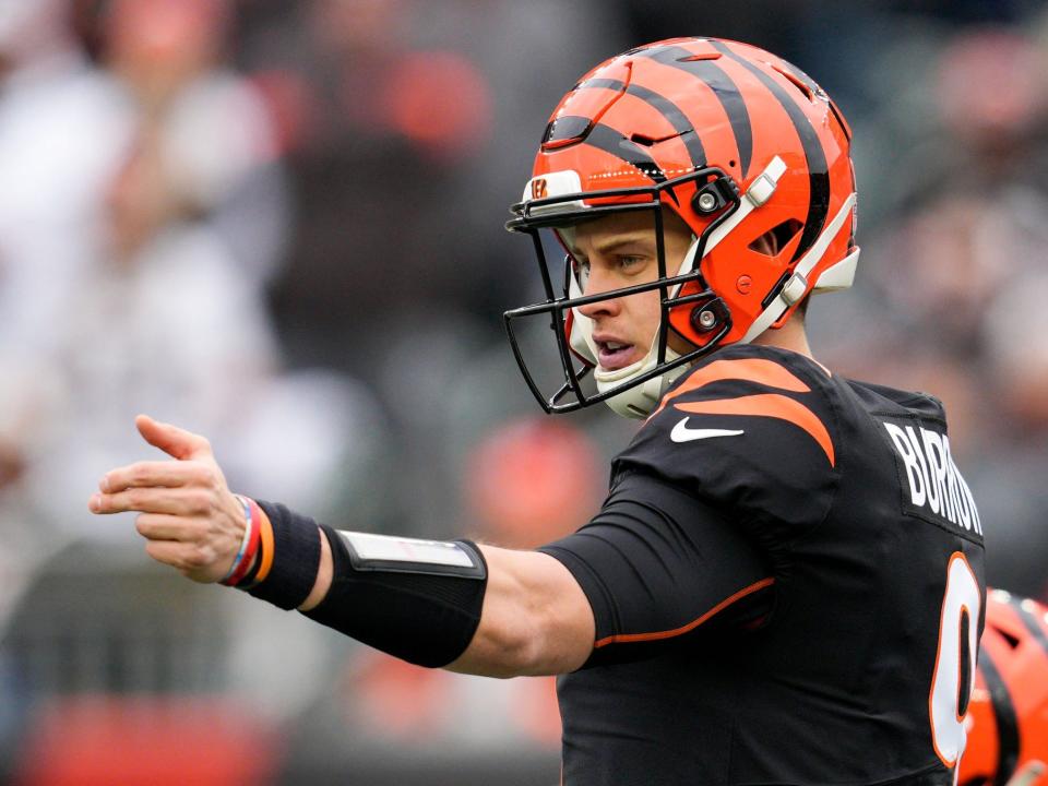 Joe Burrow gestures before a play against the Cleveland Browns.