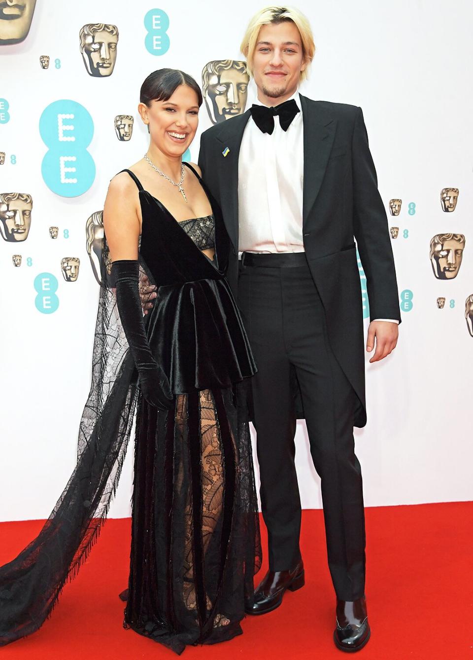 Millie Bobby Brown and Jake Bongiovi attend the EE British Academy Film Awards 2022 at Royal Albert Hall on March 13, 2022 in London, England.